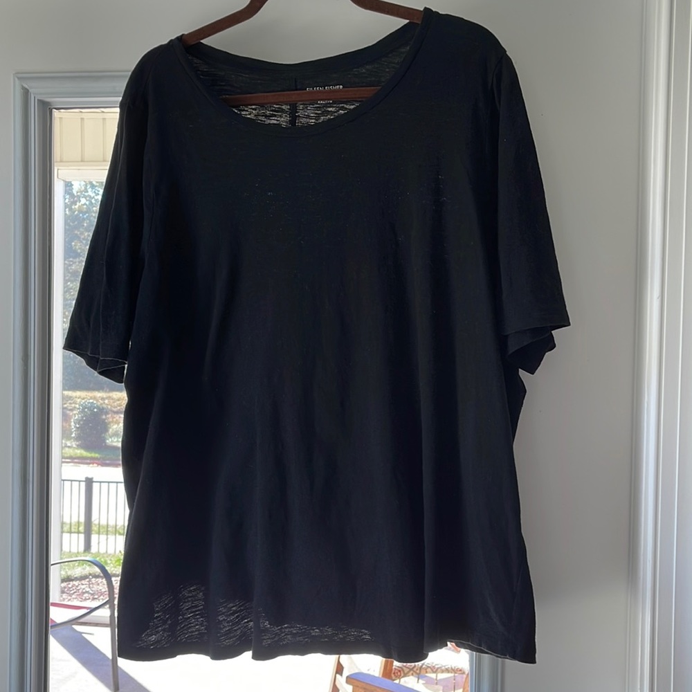 Eileen Fisher black cotton tee. Crew neck. Short sleeve. Back seam detail.